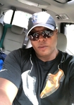 happy Dominican Republic man  from Saint Louis US25100